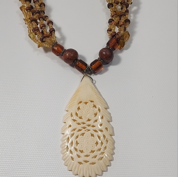 Handcrafted Wood Glass Bead Necklace with Carved Pendant - Picture 3 of 9